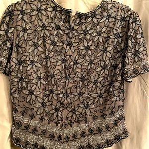 Navy and silver beaded short sleeve top. Only worn once. 100% silk shell.